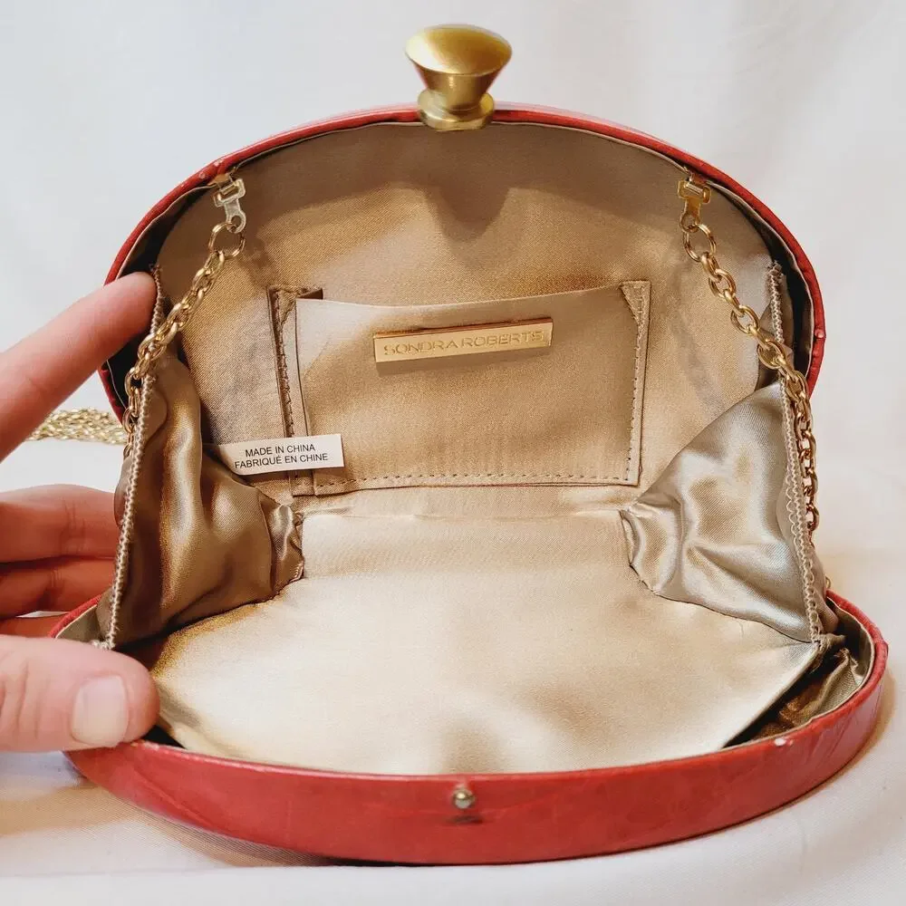 Sondra Roberts red croc embossed leather oval hard case cross body bag